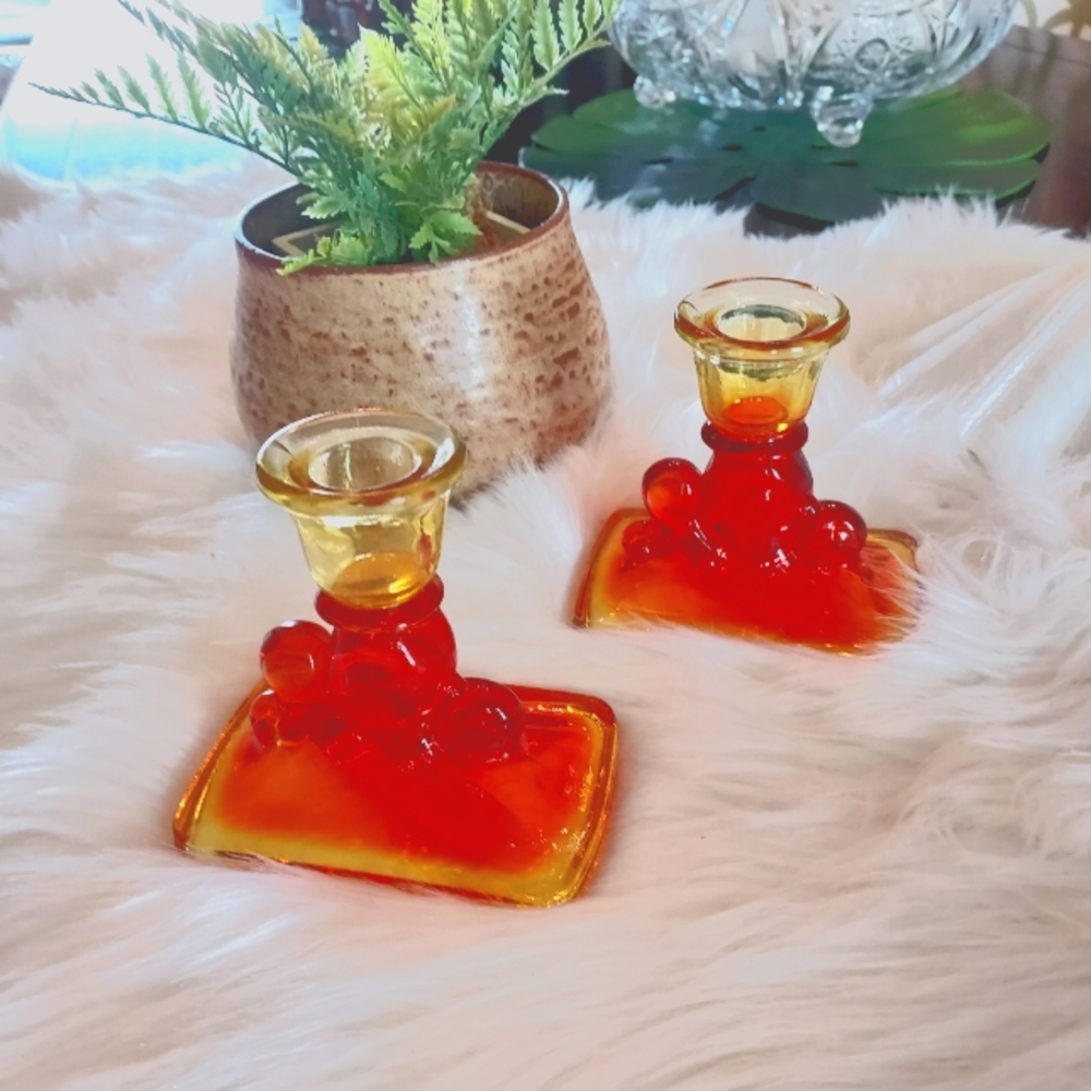 Two Art Deco Pedestal Amber Glass Candlestick Holders.